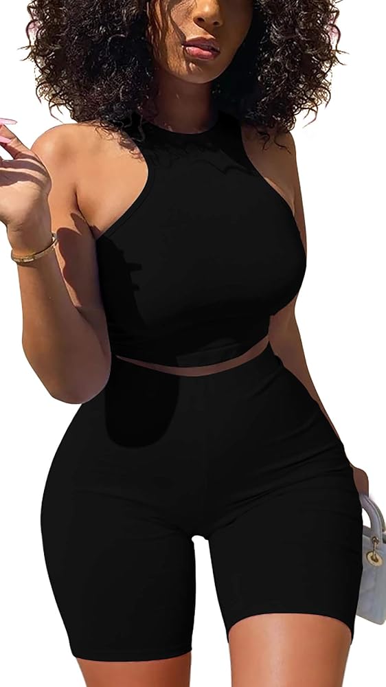 Cut from a stretch poly-spandex knit, this two piece set pairs a sleeveless racer back crop top with high waist bodycon shorts.
