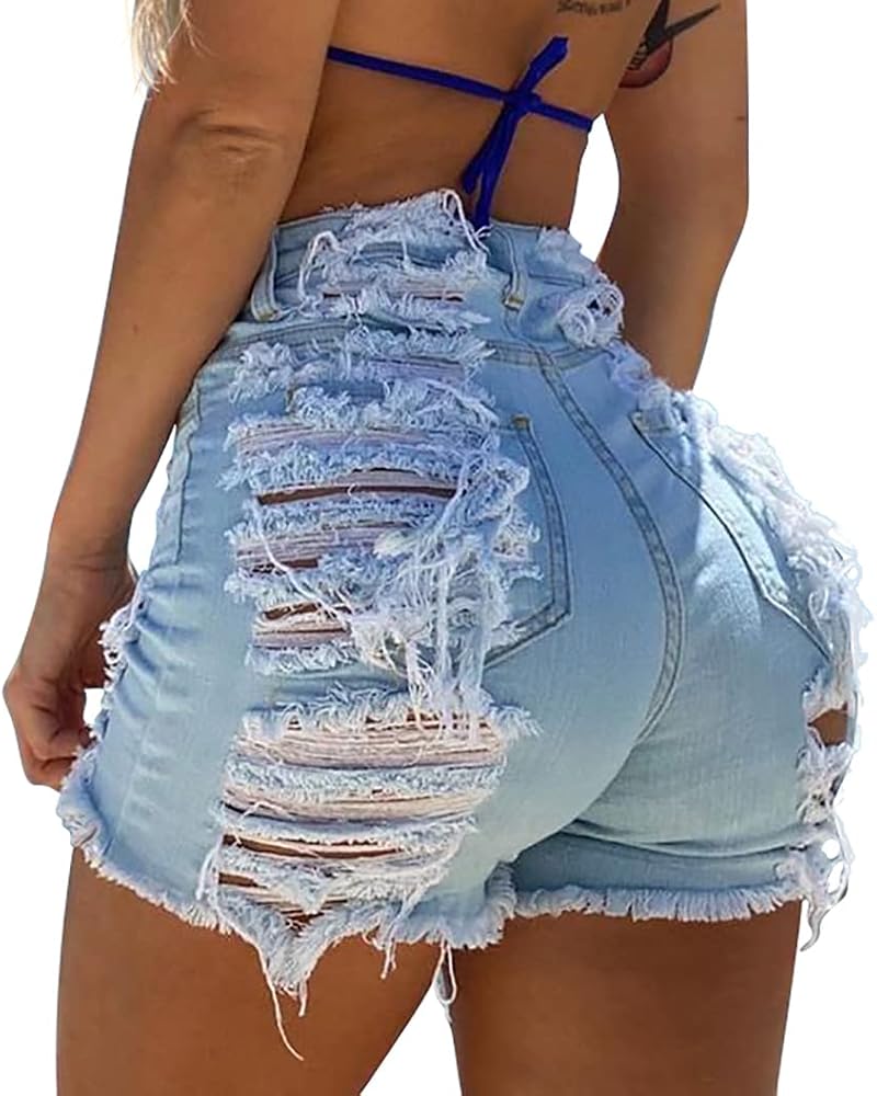 Light blue stretch denim cut close through the hip, detailed with front and back distressing and a raw frayed hem.