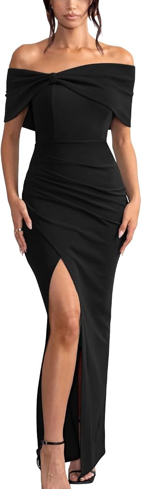 A strapless black formal dress with a ruffled shoulder detail, gathered midsection, and a high side split in thick stretch fabric.