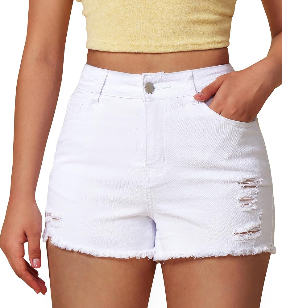 Stretch cotton denim shorts in crisp white, finished with distressed details, five pockets, and a frayed raw hem.