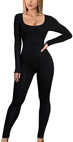A full-length black jumpsuit cut close through the body, finished with a scoop neckline and long sleeves.