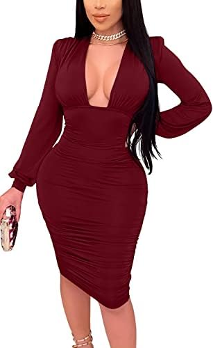 Long sleeves balance a deep plunging neckline on this wine red midi cut from soft stretch knit with gathered ruching.