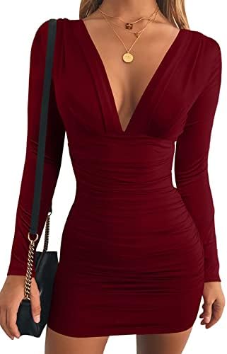 A deep V neckline meets gathered side seams in this wine red mini dress, cut close in a dense stretch blend with long sleeves.