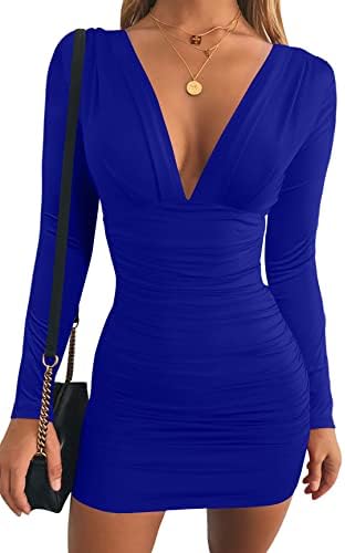 A royal blue mini dress cut in stretch knit with a deep V neck, long sleeves, and gathered side ruching.